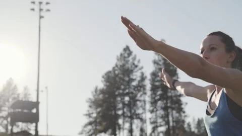 Athlete preparing for exercise in sunshine Stock Footage 78983459