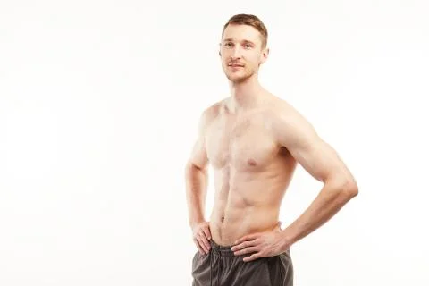 The athlete is preparing for the exercises and looking at the camera Stock Photos