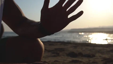 Athlete preparing a hands of for doing exercises in gym. Dust flies after the Stock Footage 121306198