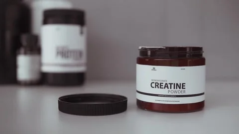 Athlete preparing monohydrate food additive for workout 库存影片 330189375