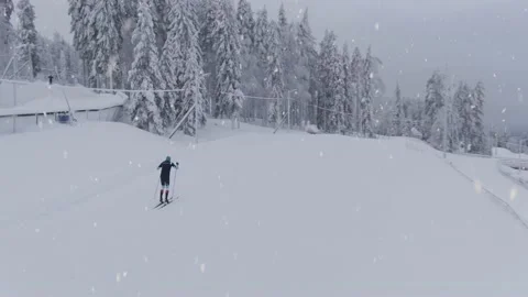 Athlete preparing for winter Olympics in cross country skiing during Stock Footage 167888802
