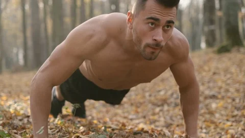 Athlete Is Pressed From The Ground In The Forest. Stock Footage 120650391