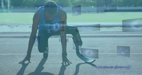 Athlete with prosthetic leg preparing to run, digital data animation over track Stock Footage 305222386