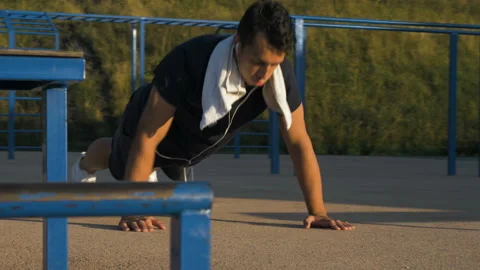 Athlete push-UPS from the ground Stock Footage 122844756