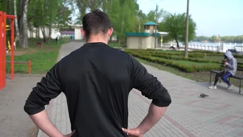 Athlete resting after exercise. View from the back Stock Footage 130347157