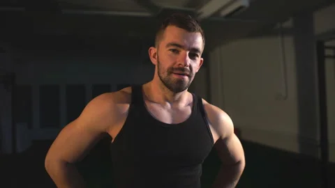 The athlete is resting after a workout,Physically Fit Young Man Resting In A Stock Footage 91153930