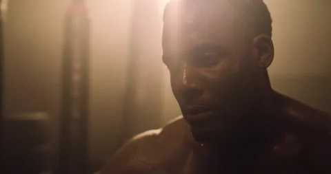 An Athlete Rests After An Intense Workout Session In A Crossfit Gym Stock Footage 158474154