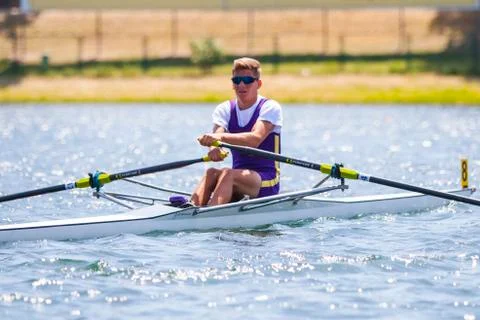 Athlete on a rowing competition Stock Photos