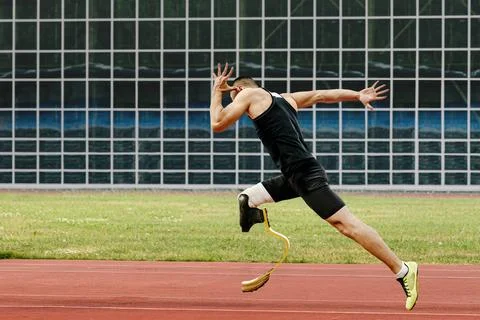 Athlete runner disabled running on track Stock Photos