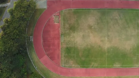 Athlete running along a horizontal track Stock Footage 140038908