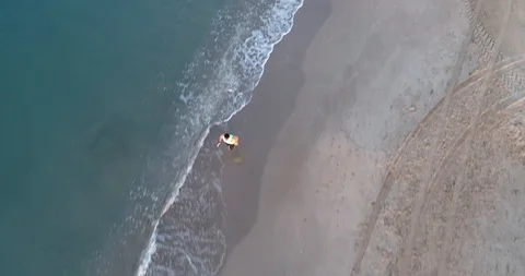 Athlete running on the beach Stock Footage 101098174