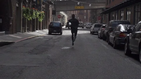 Athlete running downtown Stock Footage 86881852