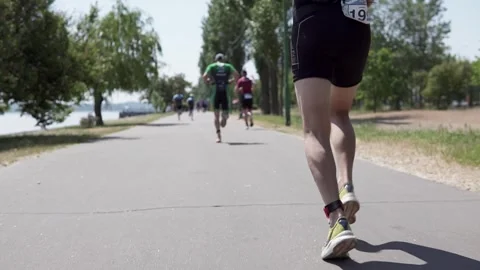 The athlete is running a marathon. A quick workout for a champion. Stock Footage 277709477