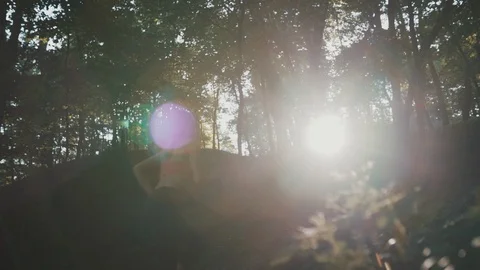 Athlete running in the park at sunset Stock Footage 123934342