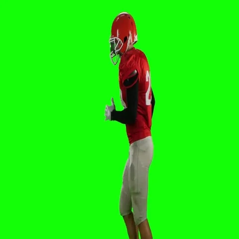 Athlete runs in protective gear with helmet and gloves. Green screen Stock Footage