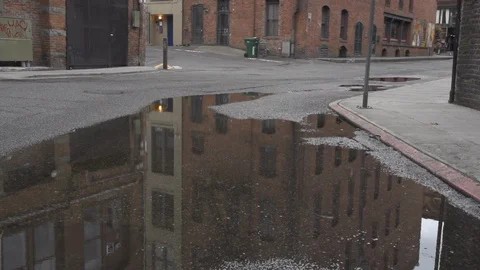 Athlete runs through puddle 2 Stock Footage 86882542