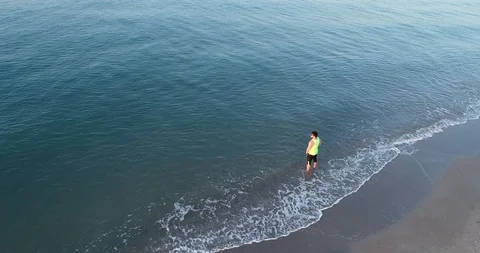 Athlete on the seashore Stock Footage 101098306