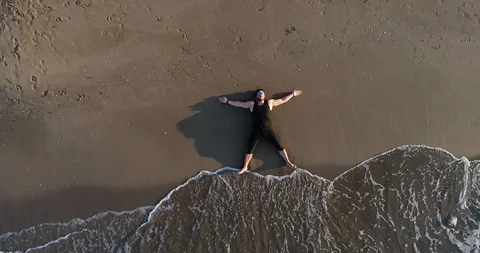 Athlete on the seashore Stock Footage 101098884