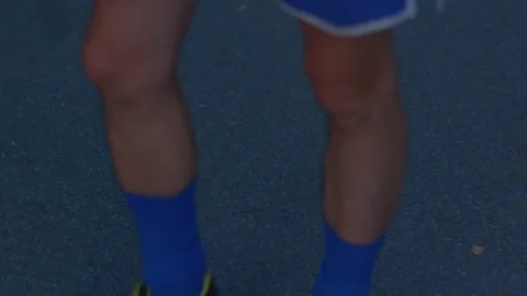 Athlete skipping energetically, Fastpaced exercise on city sidewalk Stock Footage 321030001