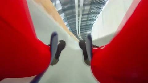 The athlete on the sledge goes down on a bobsleigh track 스톡 동영상 98215215