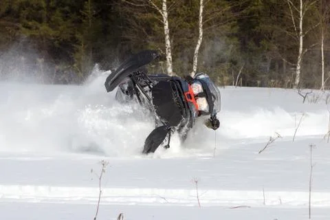 Athlete on a snowmobile. Stock Photos
