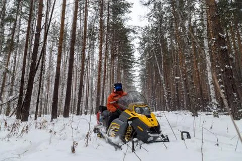 Athlete on a snowmobile Stock Photos