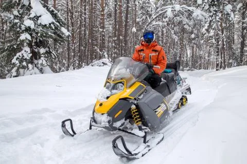 Athlete on a snowmobile Stock Photos