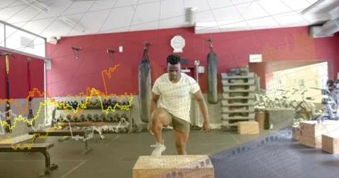 Athlete stepping off plyo box, doing single-leg stepups then jumping, chart Stock Footage 334031253