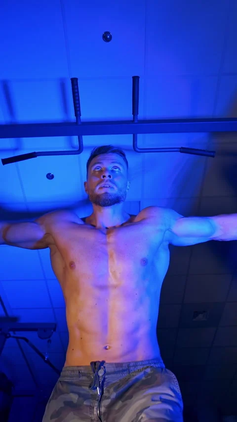 Athlete with strong body doing work out pushing up excercise in gym. Stock Footage 296432241