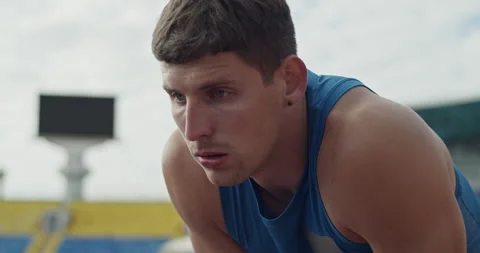 Athlete taking break on cloudy day Stock Footage 199652685