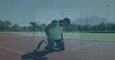 Athlete on track with digital interface image over circuit board elements Stock Photos