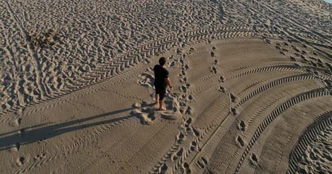 Athlete training on the beach Stock Footage 101099165
