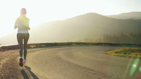 Athlete training on dusk Stock Footage 56918604