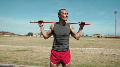 Athlete Training His Upper Body With A Bar Stock Footage 278864131
