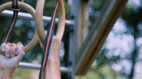 Athlete trains on the rings Video stock 100127794