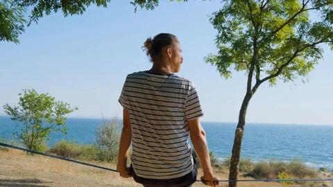 Athlete walking in slackline Stock Footage 121286830