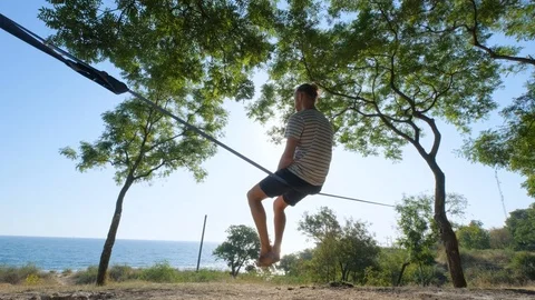 Athlete walking in slackline Stock Footage 121286840