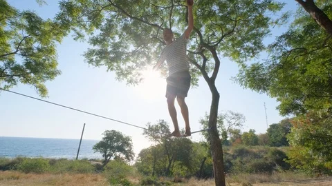 Athlete walking in slackline Stock Footage 121287815