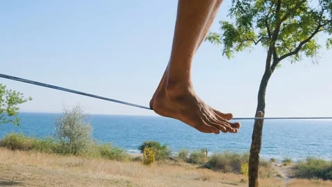 Athlete walking in slackline Stock Footage 121287855