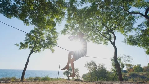 Athlete walking in slackline Stock Footage 121288246