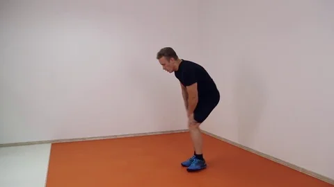 Athlete warming up before a workout Stock Footage 70562728