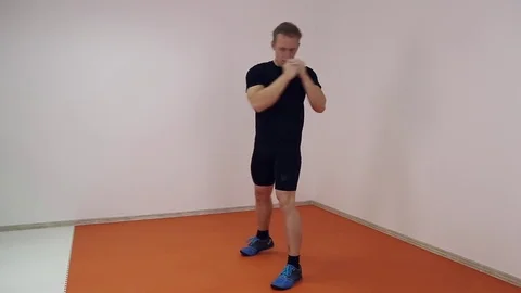 Athlete warming up before a workout Stock Footage 70562960