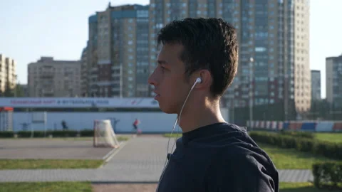 The athlete warms up before classes on simulators Stock Footage 118874278