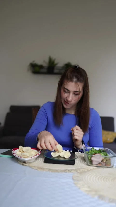 Athlete weighs every chip before eating Stock Footage 339854946