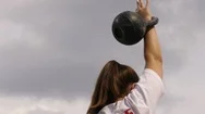 Athlete Woman Lifting Weight On Cloudy Sky Background. Sport Woman Training With Stock Footage