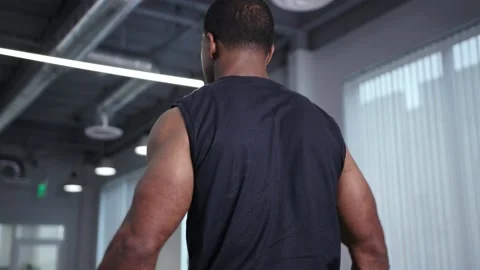 Athlete working out with free weights at home Stock Footage 133536928