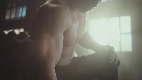 Athlete working out using dumbbell Stock Footage 236181743