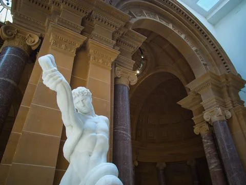 Athlete wrestling with a python Stock Photos