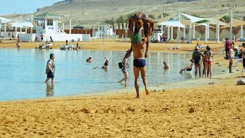 Athletes acrobats are training and making tricks Stock Footage
