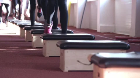 Athletes are training by running on stools. (sport steps) Stock Footage 286031026